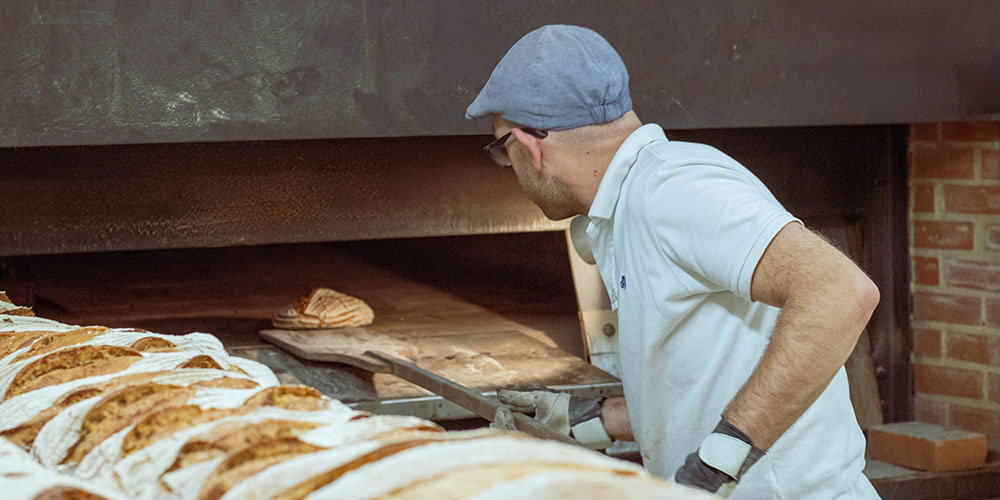 A person baking bread