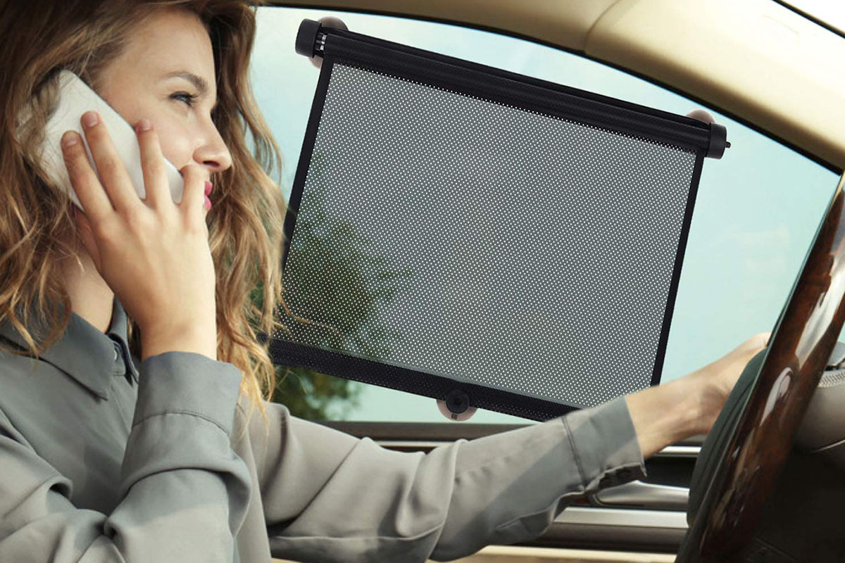 A person driving while talking on a cell phone